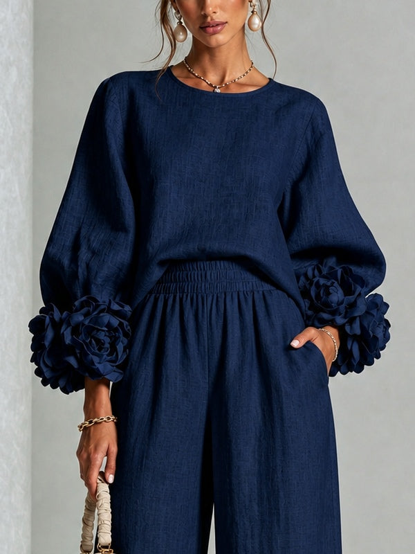Navy Top Featuring Striking Floral Cuffs Paired With Wide-leg Pants Suit