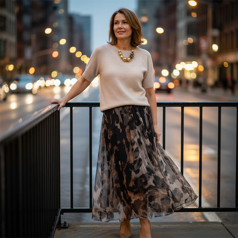 Two Piece Set for Women Comprising a Sweater and a Flowing Leopard Print Skirt