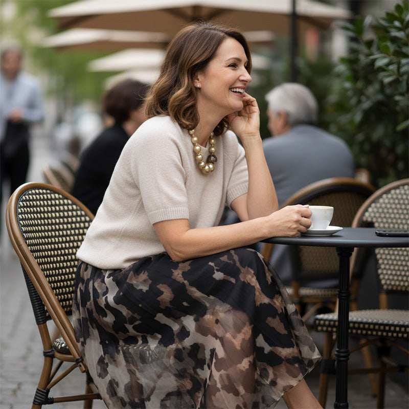 Two Piece Set for Women Comprising a Sweater and a Flowing Leopard Print Skirt